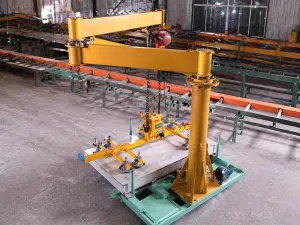 Automotive Industry 6 Image Alt: Articulating Jib Crane for compact workstation lifting