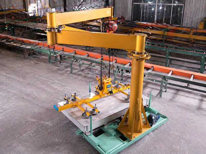 Image Alt: Articulating Jib Crane for compact workstation lifting