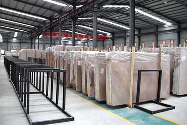 Real stone crane handling marble slabs