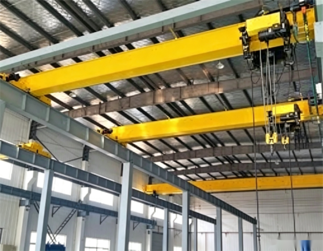 Low-headroom overhead crane installation in a factory